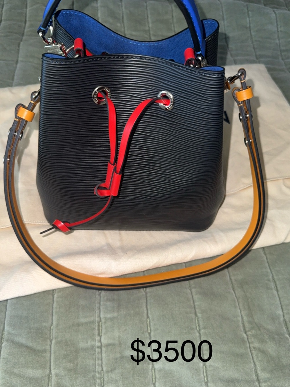Louis Vuitton Black Bucket Bag with Red Drawstring and Yellow Strap